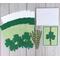 A greeting card kit with green gingham paper, green cardstock, glitter shamrock embellishments, shamrock twill ribbons and cards/envelopes.
